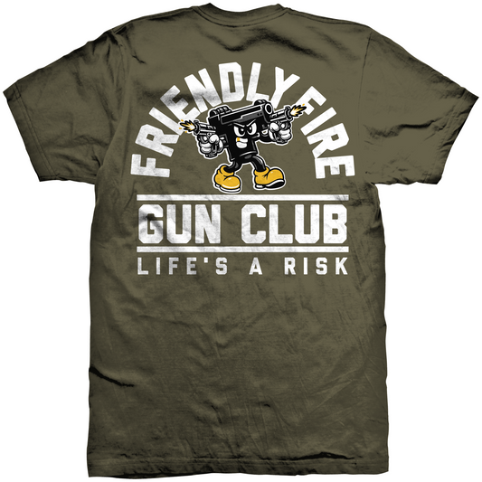 Life’s a Risk t-shirt by Friendly Fire Gun Club featuring Sparky mascot. OD Green cotton tee with large back print and left chest logo. Funny gun shirt with bold graphic style.